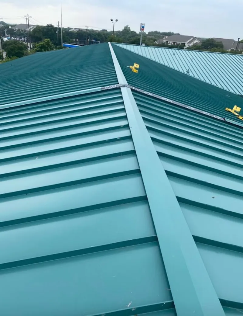 Green commercial metal roof ridge and valley for Metal Roof Repair in Westmoreland